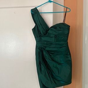 A green nice dress with one strap